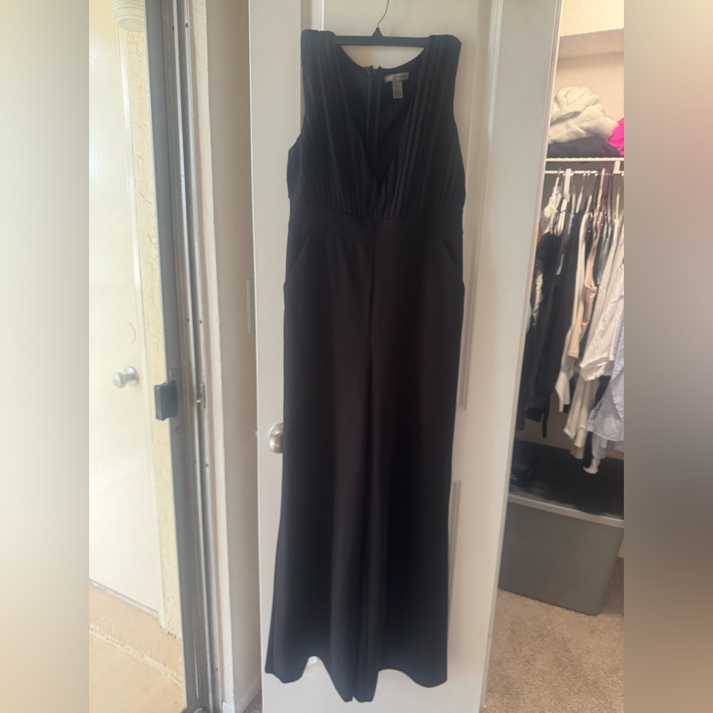 Black Jumpsuit (low neck, runs big)